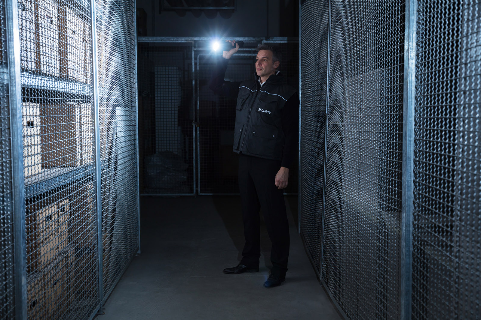 Security Guard Standing In The Warehouse | 24/7 Manned Guarding | London